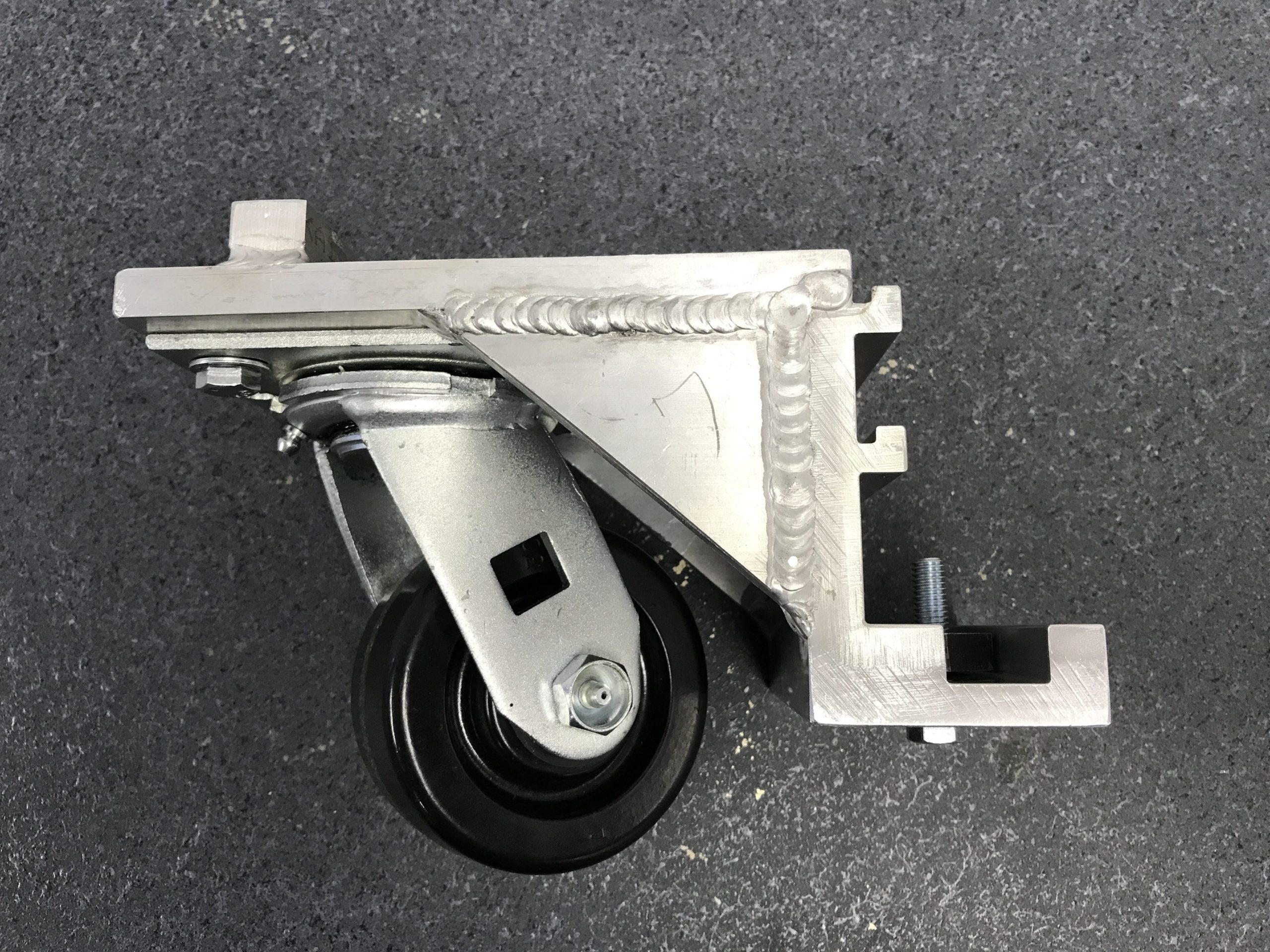 Wheel castor extrusion attachments for UNI-DEC